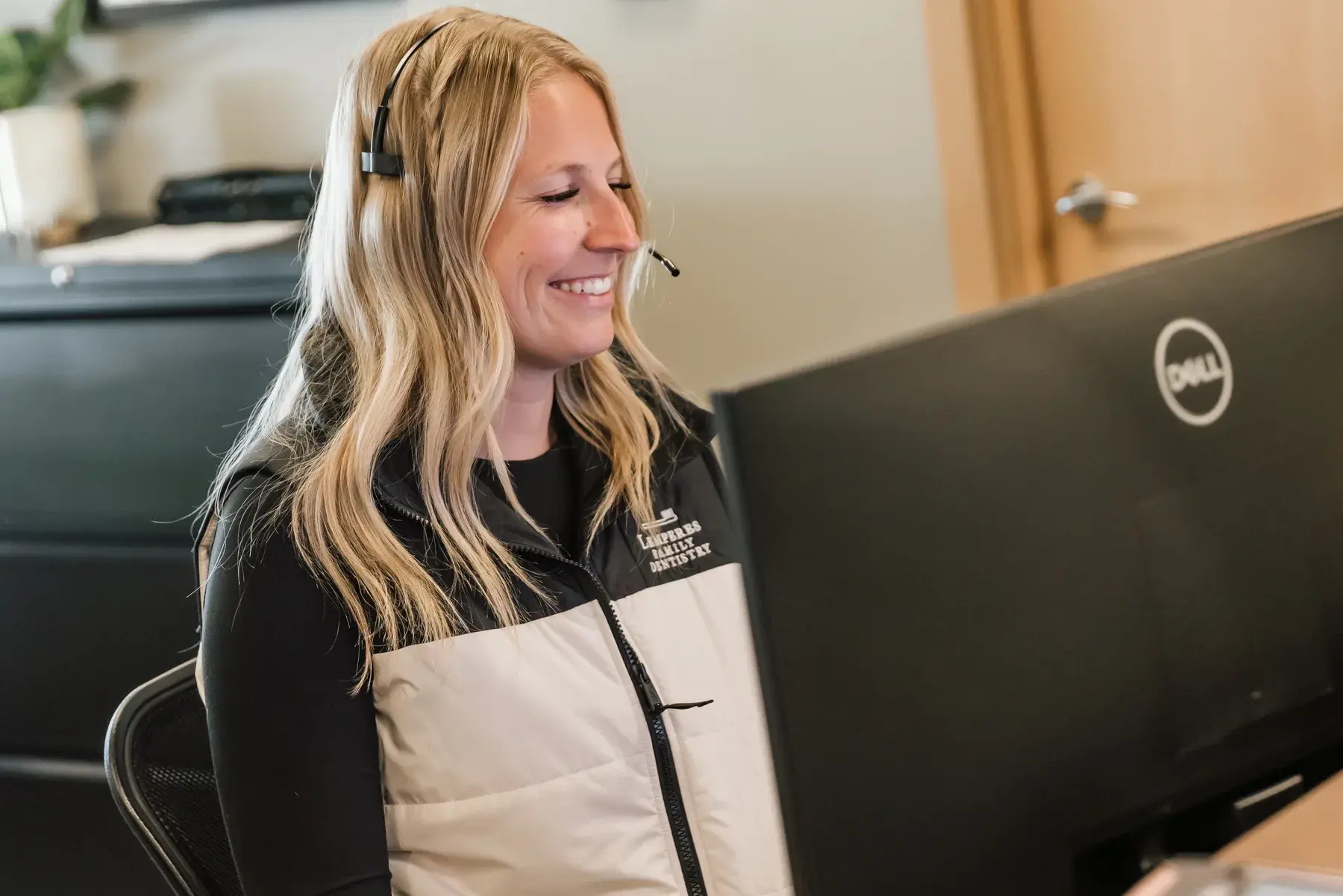 A team member at the Lemperes Family Dentistry front desk